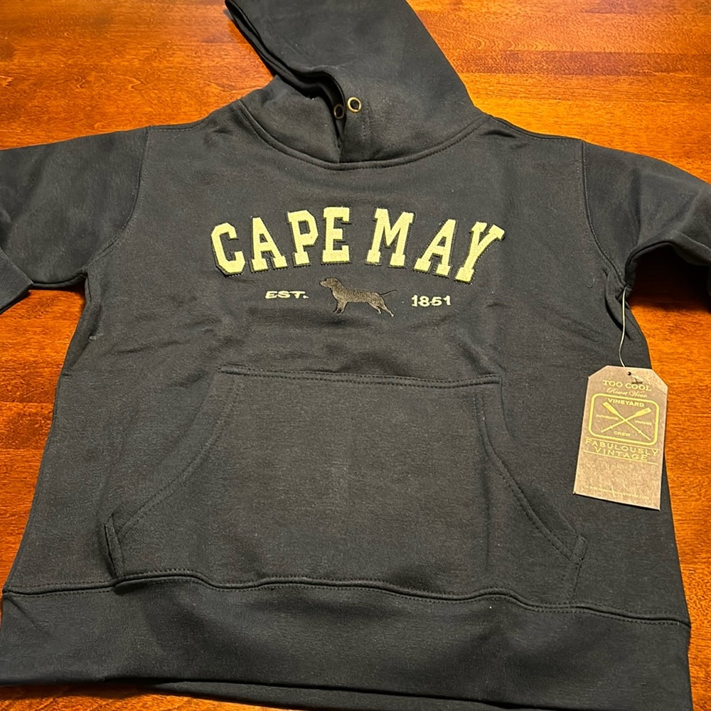 Navy blue new kids large sweatshirt. Cape may on front